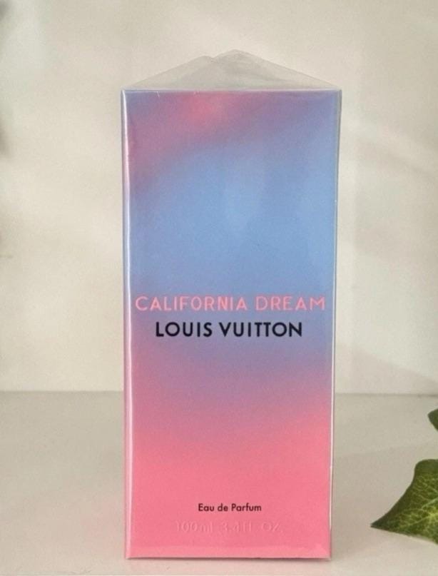 Louis Vuitton California Dream Eau de Parfum box with a pink and blue gradient design, standing upright on a light surface.